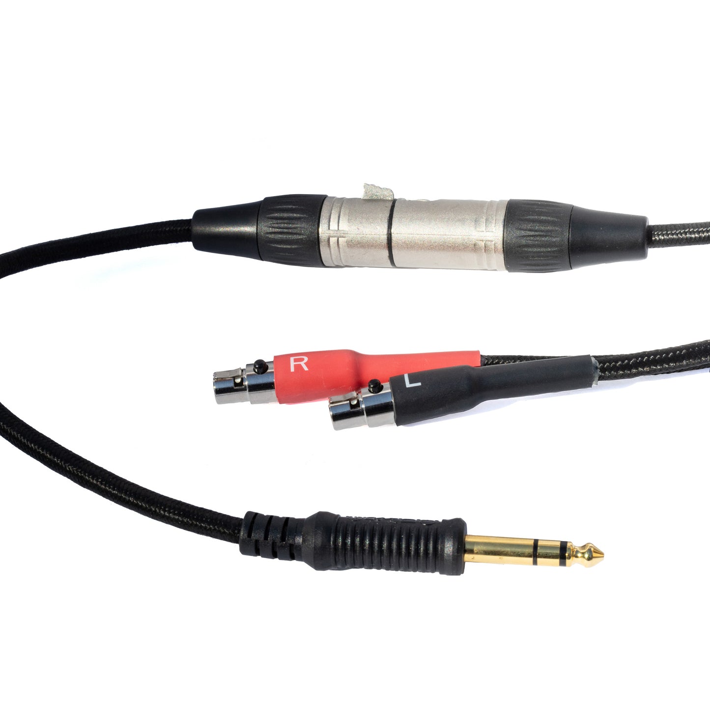Sideways close up of Grado Gold Detachable audio Cables on a white background. The plugs are red and black. The red plug has a white R on it and the black plug has a white L on it.