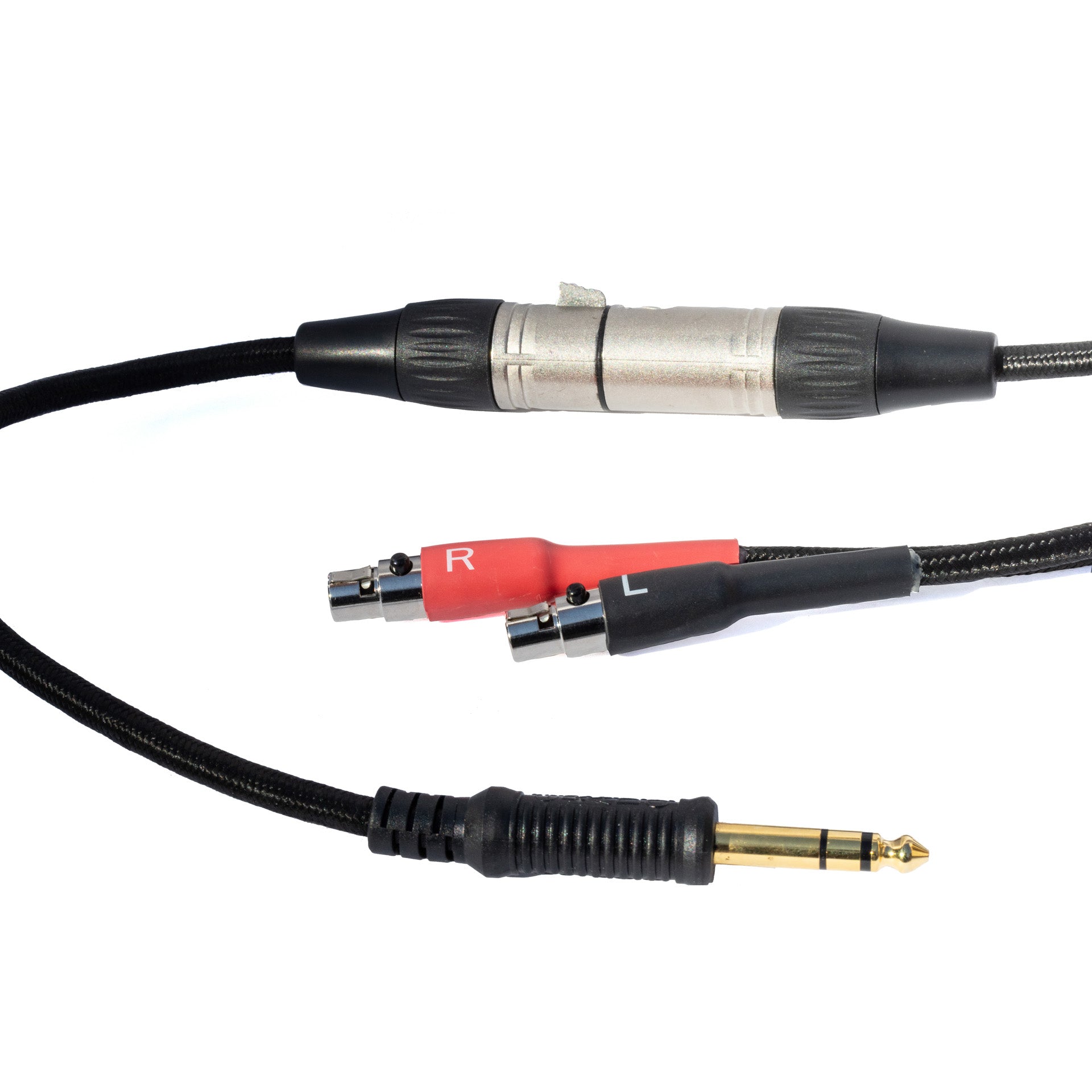 Sideways close up of Grado Gold Detachable audio Cables on a white background. The plugs are red and black. The red plug has a white R on it and the black plug has a white L on it.