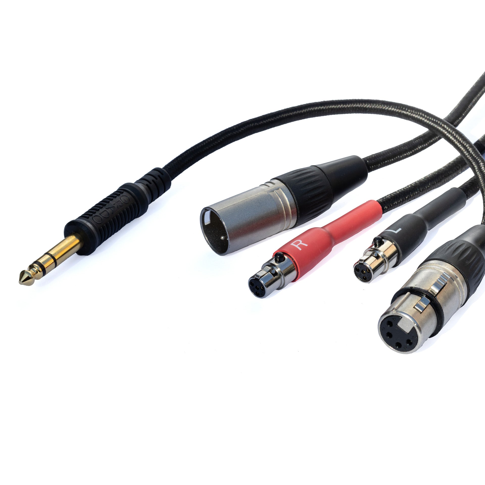 Sideways close up of Grado Gold Detachable audio Cables on a white background taken from a 3/4 view. One portion of the cable is curved around the other portion. The plugs are red and black. The red plug has a white R on it and the black plug has a white L on it. T