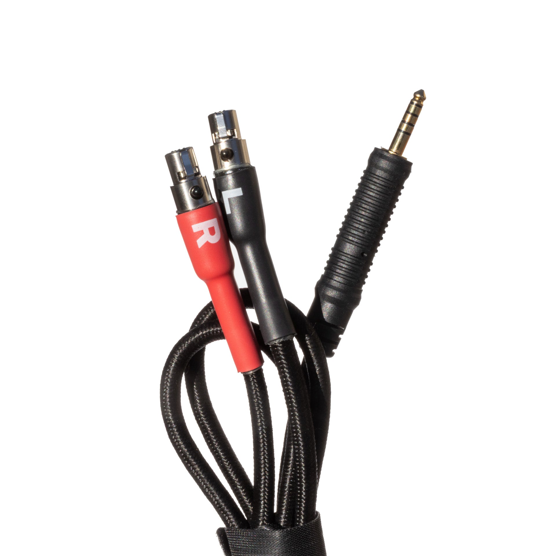 Close up of Grado Gold Detachable audio Cables facing upwards on a white background. The plugs are red and black.