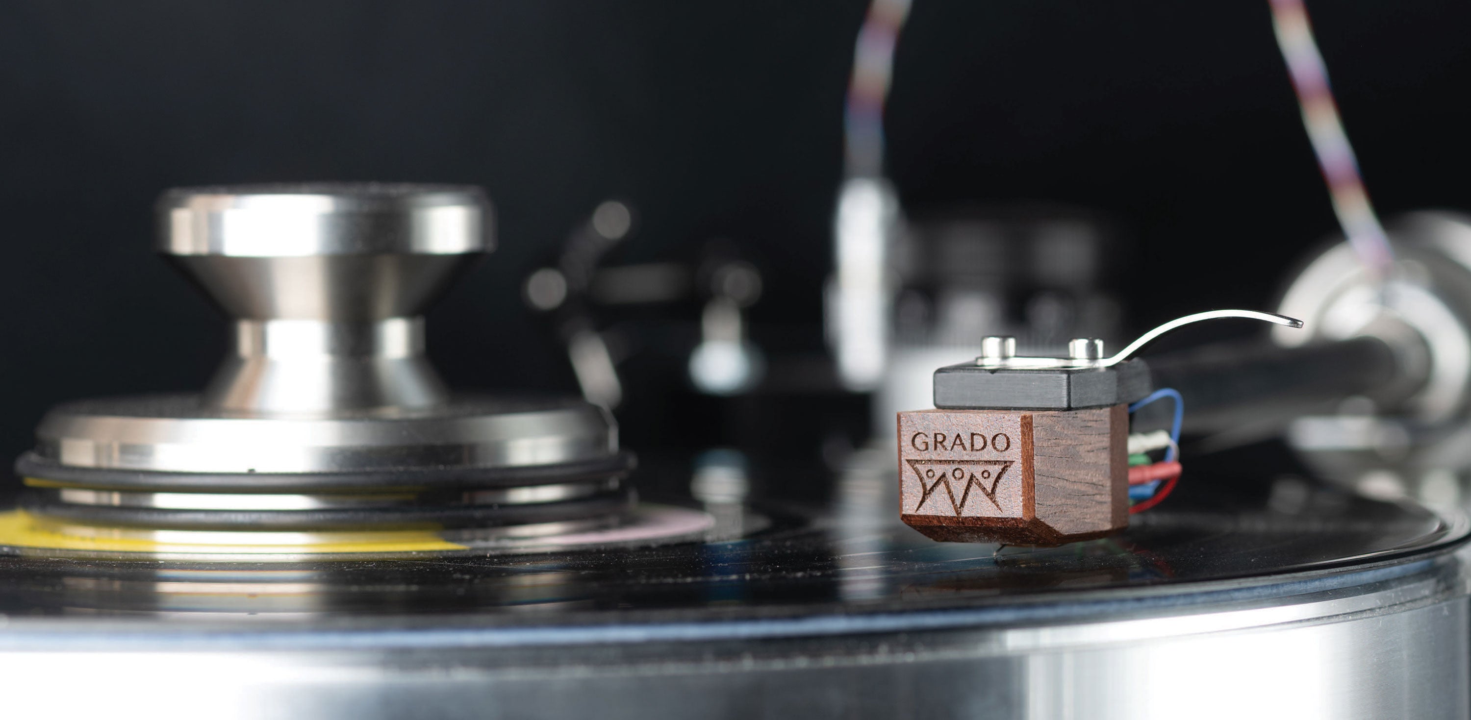 Photo of a grado cartridge on a turntable.