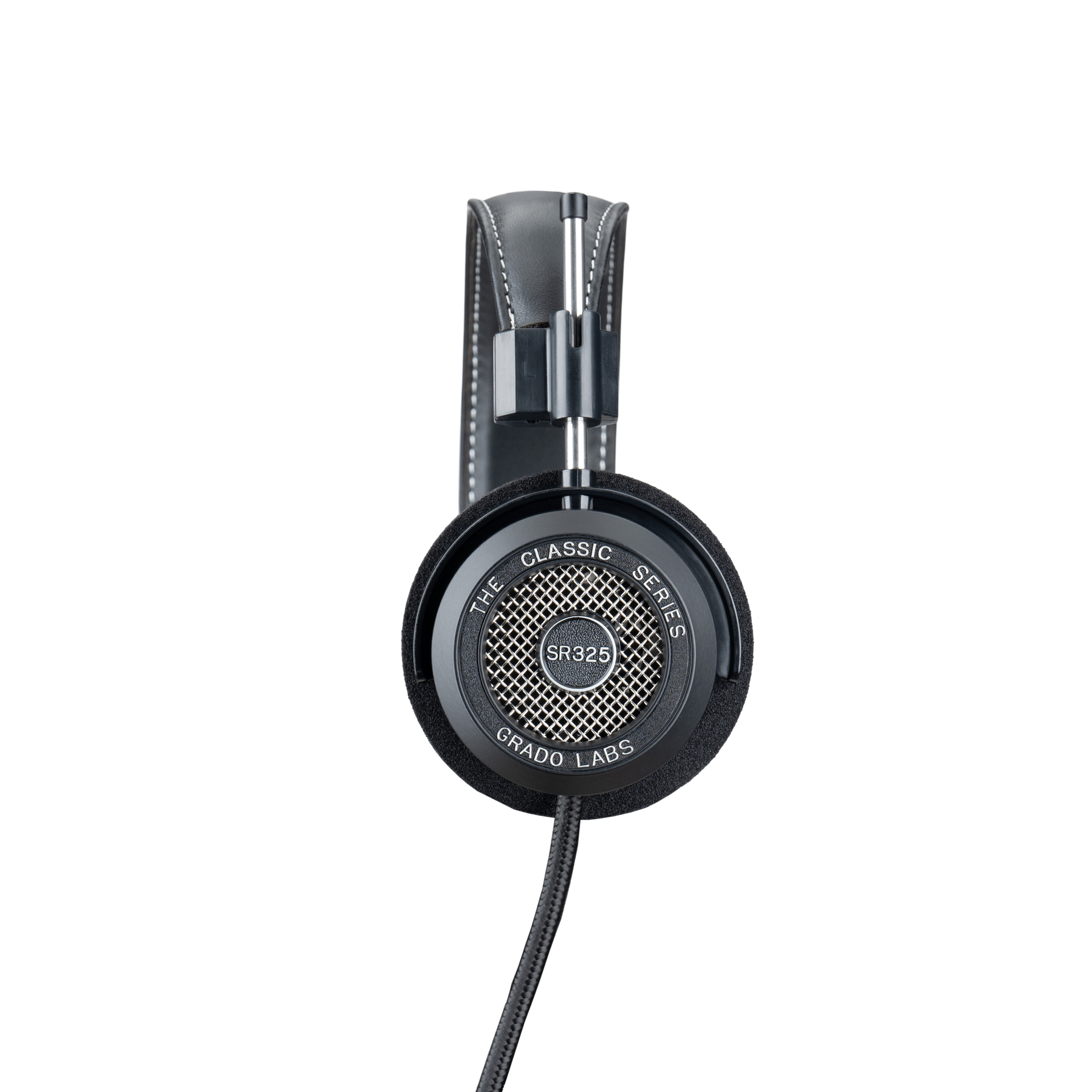 Photo of the Grado SR325 Headphones taken from the side - the model name - SR325 - is featured in the center of the ear cup. The Words - The Classic Series - and - Grad Labs are written around the outer edge of the ear cup.
