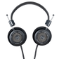 Photo of Grado SR325 Headphones  taken from the top - both the left and right ear cups can be seen and have the model name - SR325 - in the center - and - The Classic Series - and - Grado Labs - are written on the outer edge of the ear cups. The cables can be seen coming out of the headphone.