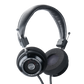 Photo of Grado SR325 Headphones  taken from 3/4 view - one ear cup is facing away from view while the other is showing the model name - SR325 - can be seen in the center and the words - The Classic Series - and - Grado Labs are written on the outside edge of the ear cups. The cables can be seen coming out of the headphone.