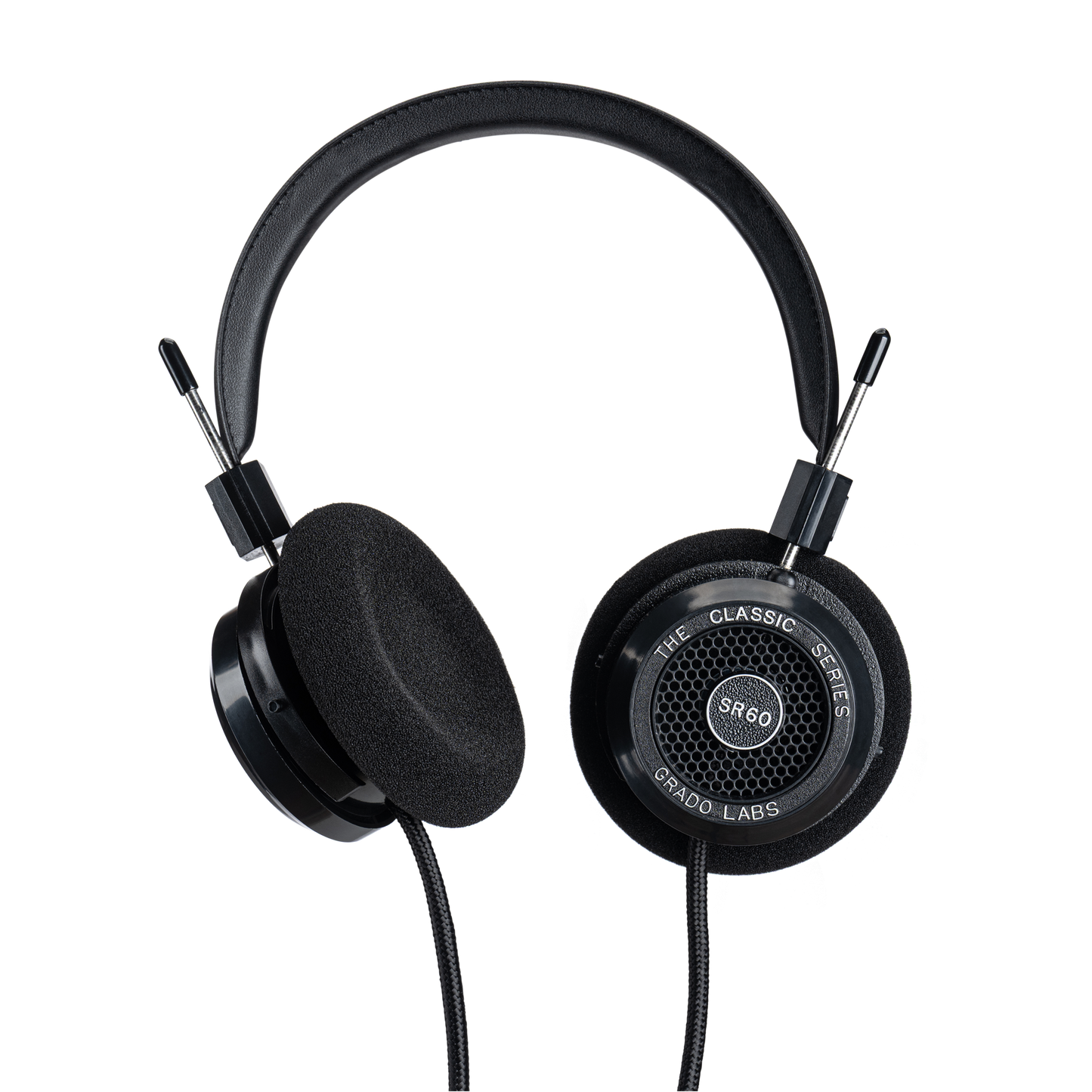 Photo of Grado SR60 Headphones  taken from 3/4 view - one ear cup is facing away from view while the other is showing the model name - SR60 - can be seen in the center and the words - The Classic Series - and - Grado Labs are written on the outside edge of the ear cups. The cables can be seen coming out of the headphone.