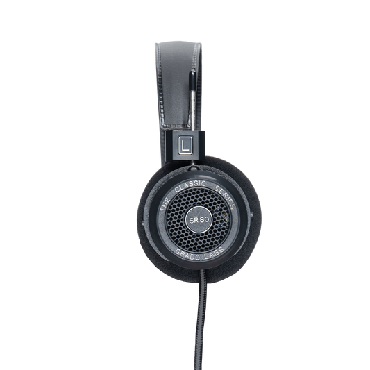 Photo of the Grado SR80 Headphones taken from the side - the model name - SR80 - is featured in the center of the ear cup. The Words - The Classic Series - and - Grado Labs are written around the outer edge of the ear cup.