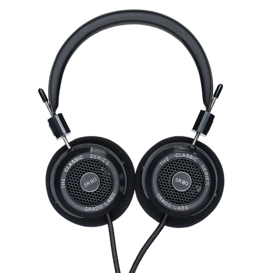 Photo of Grado SR80 Headphones  taken from the top - both the left and right ear cups can be seen and have the model name - SR80 - in the center - and - The Classic Series - and - Grado Labs - are written on the outer edge of the ear cups. The cables can be seen coming out of the headphone.