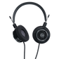 Photo of Grado SR80 Headphones  taken from 3/4 view - one ear cup is facing away from view while the other is showing the model name - SR80 - can be seen in the center and the words - The Classic Series - and - Grado Labs are written on the outside edge of the ear cups. The cables can be seen coming out of the headphone.