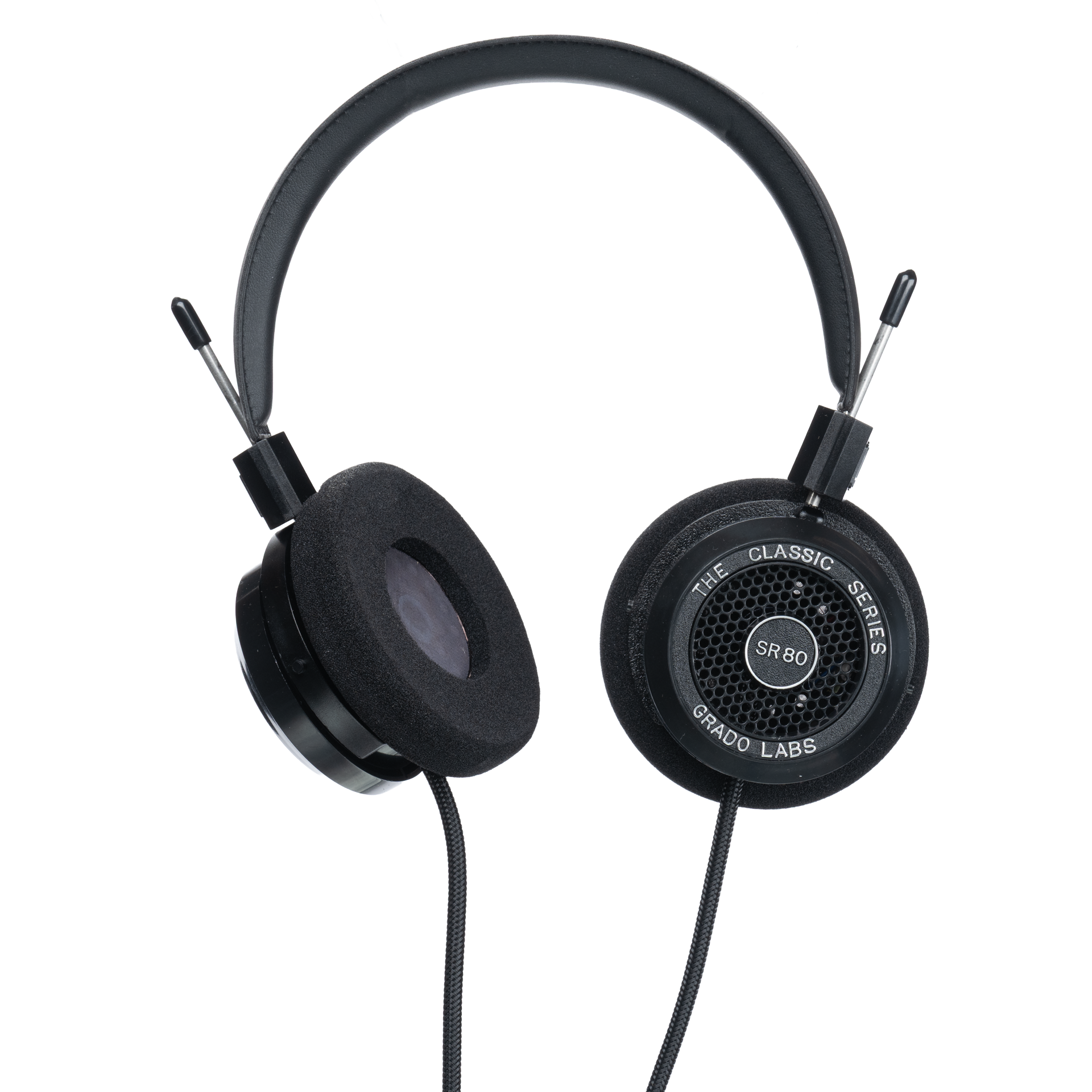 Photo of Grado SR80 Headphones  taken from 3/4 view - one ear cup is facing away from view while the other is showing the model name - SR80 - can be seen in the center and the words - The Classic Series - and - Grado Labs are written on the outside edge of the ear cups. The cables can be seen coming out of the headphone.