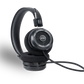 Photo of Grado SR80 Headphones taken from the 3/4 view - One ear cup is facing down while the other ear cup is facing outward - showing the model name in the center - SR80 - and the words - The Classic Series - and - Grado Labs - written along the edge of the ear cups.