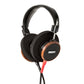 Photo of Grado S550 Headphones on a white background taken from 3/4 view - one ear cup is facing away from view while the other is showing the Grado logo in the center. The red/black cables can be seen coming out of the headphone.