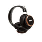 Photo of Grado S550 Headphones on a white background taken from the 3/4 view - One ear cup is facing down while the other ear cup is facing outward - showing the Grado logo.