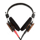 Photo of Grado S550 Headphones on a white background taken from the back - the red/black cables can be seen coming out of the headphone.