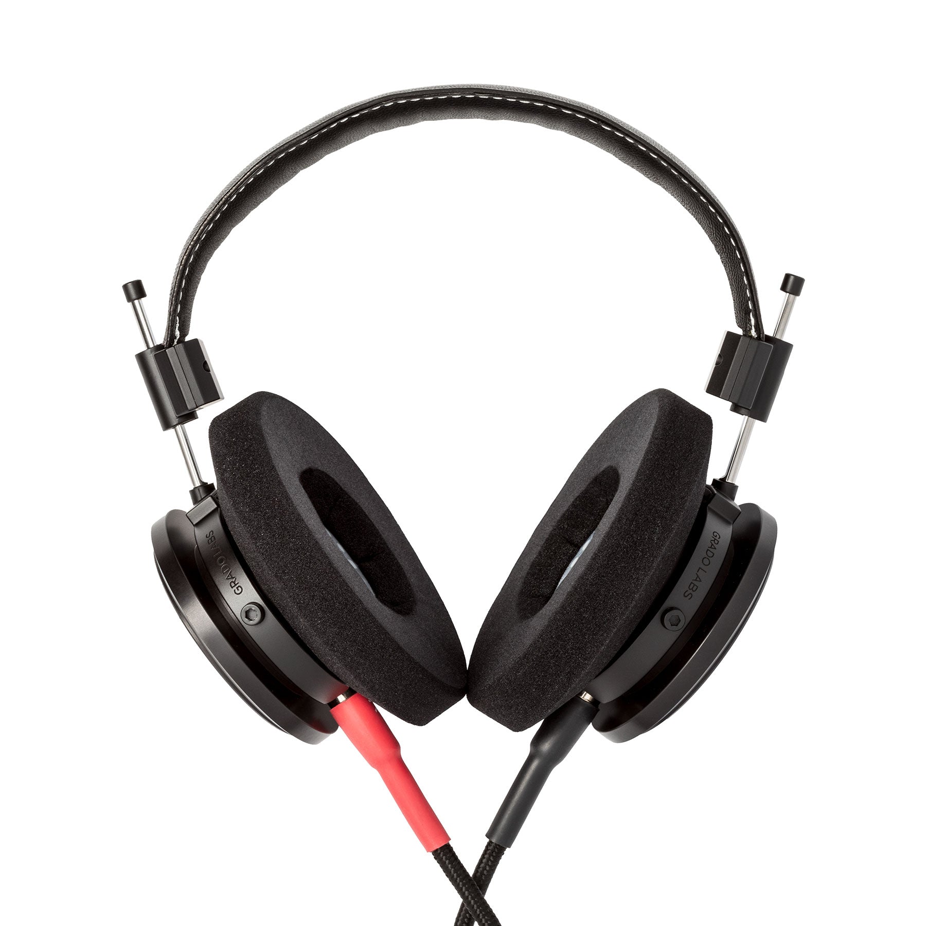 Photo of Grado S750 Headphones on a white background taken from the back - the red/black cables can be seen coming out of the headphone.