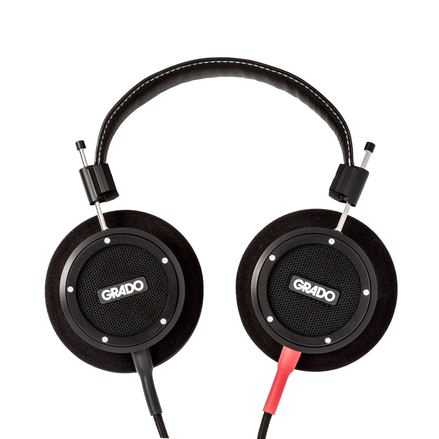Photo of Grado S750 Headphones on a white background taken from the top - both the left and right ear cups can be seen and have the Grado logo in the center - the red/black cables can be seen coming out of the headphone.