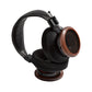 3/4 view photo of the Grado S950 Headphones taken on a white background. One ear cup is facing down while the other ear cup is facing to the side.
