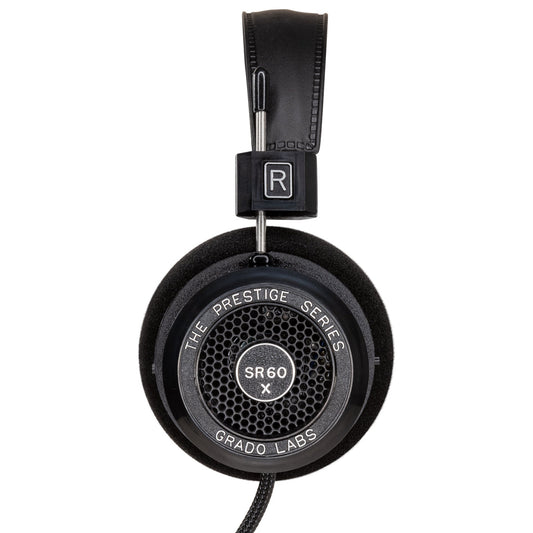 Photo of the Grado SR60x Headphones taken from the side - the model name - SR60x - is featured in the center of the ear cup. The Words - The Prestige Series - and - Grado Labs are written around the outer edge of the ear cup.