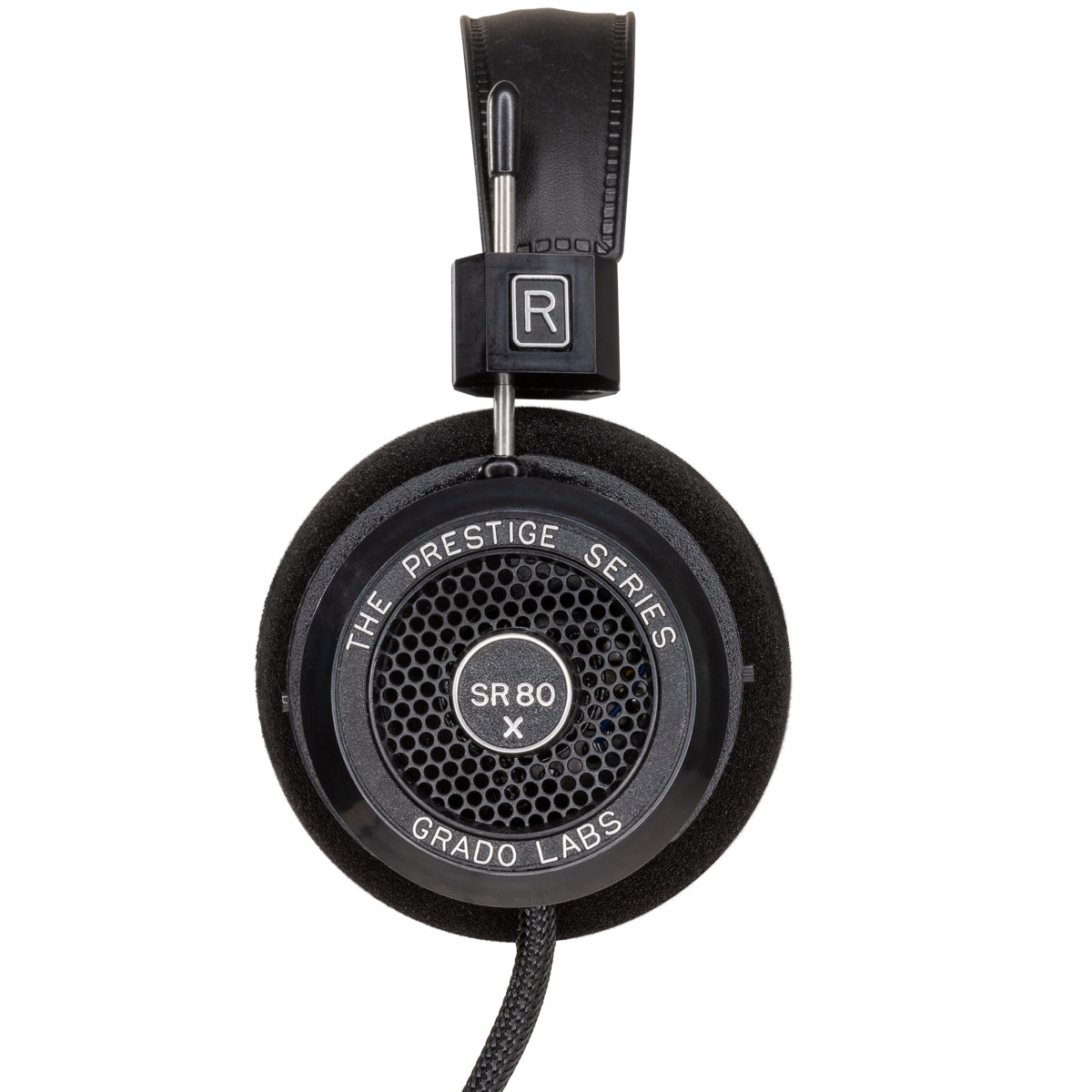 Photo of the Grado SR80x Headphones taken from the side - the model name - SR80x - is featured in the center of the ear cup. The Words - The Prestige Series - and - Grado Labs are written around the outer edge of the ear cup.