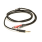 Close up of Grado Gold Detachable audio Cables on a white background. The cable is coiled around itself. The plugs are red and black. The red plug has a white R on it and the black plug has a white L on it. T