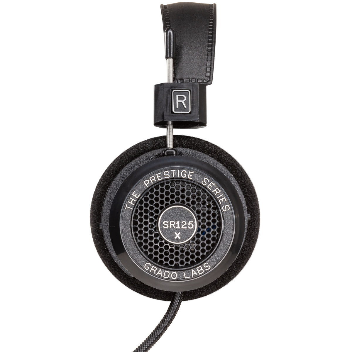 Photo of the Grado SR125x Headphones taken from the side - the model name - SR125x - is featured in the center of the ear cup. The Words - The Prestige Series - and - Grado Labs are written around the outer edge of the ear cup.